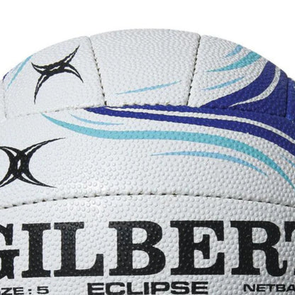 Close-up of a Gilbert Eclipse netball with branding and size information.