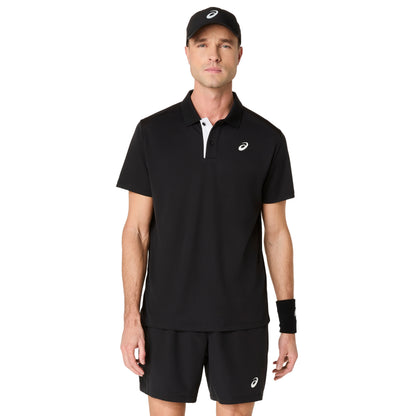 Man wearing a black polo shirt and shorts with a visible brand logo on a white background