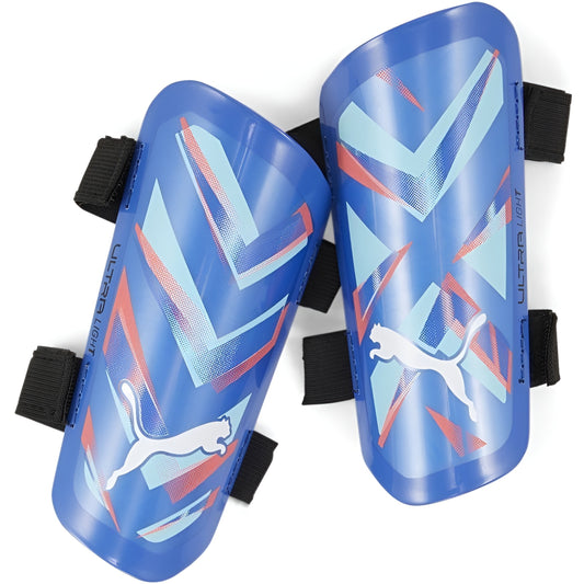 Blue shin guards with Puma logo on a white background