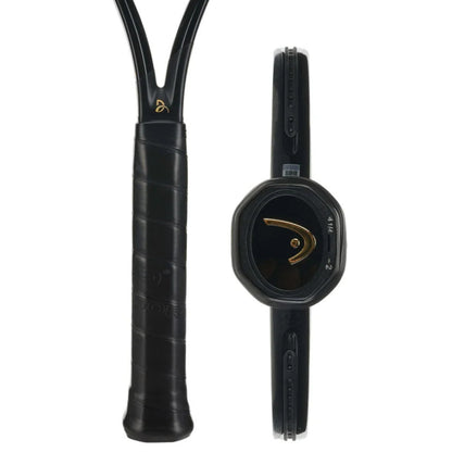 Black Head tennis racket with a close-up of the handle on a white background