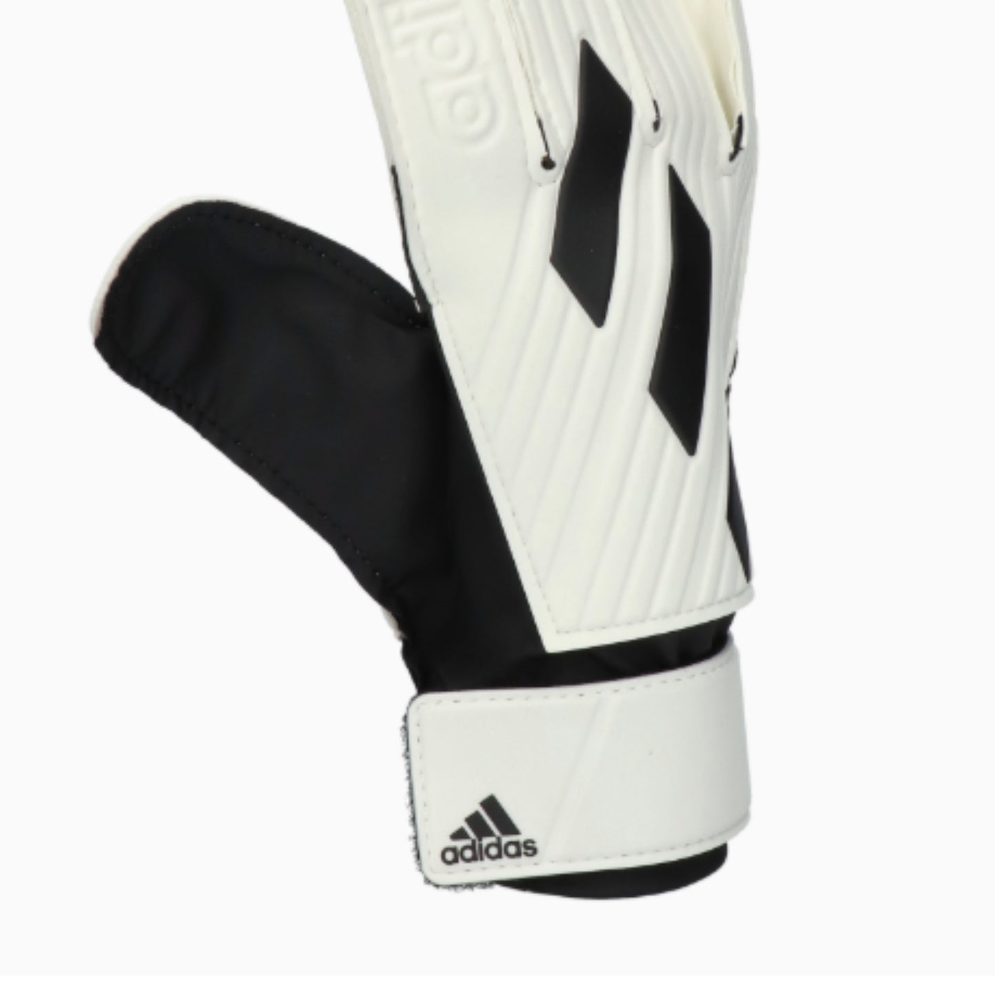 Black and white Adidas glove on a white background