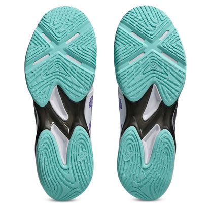 A pair of tennis shoes from the bottom, displaying their textured turquoise and white outsoles with black structural accents in the center.
