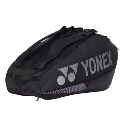 Black Yonex tennis bag on a white background