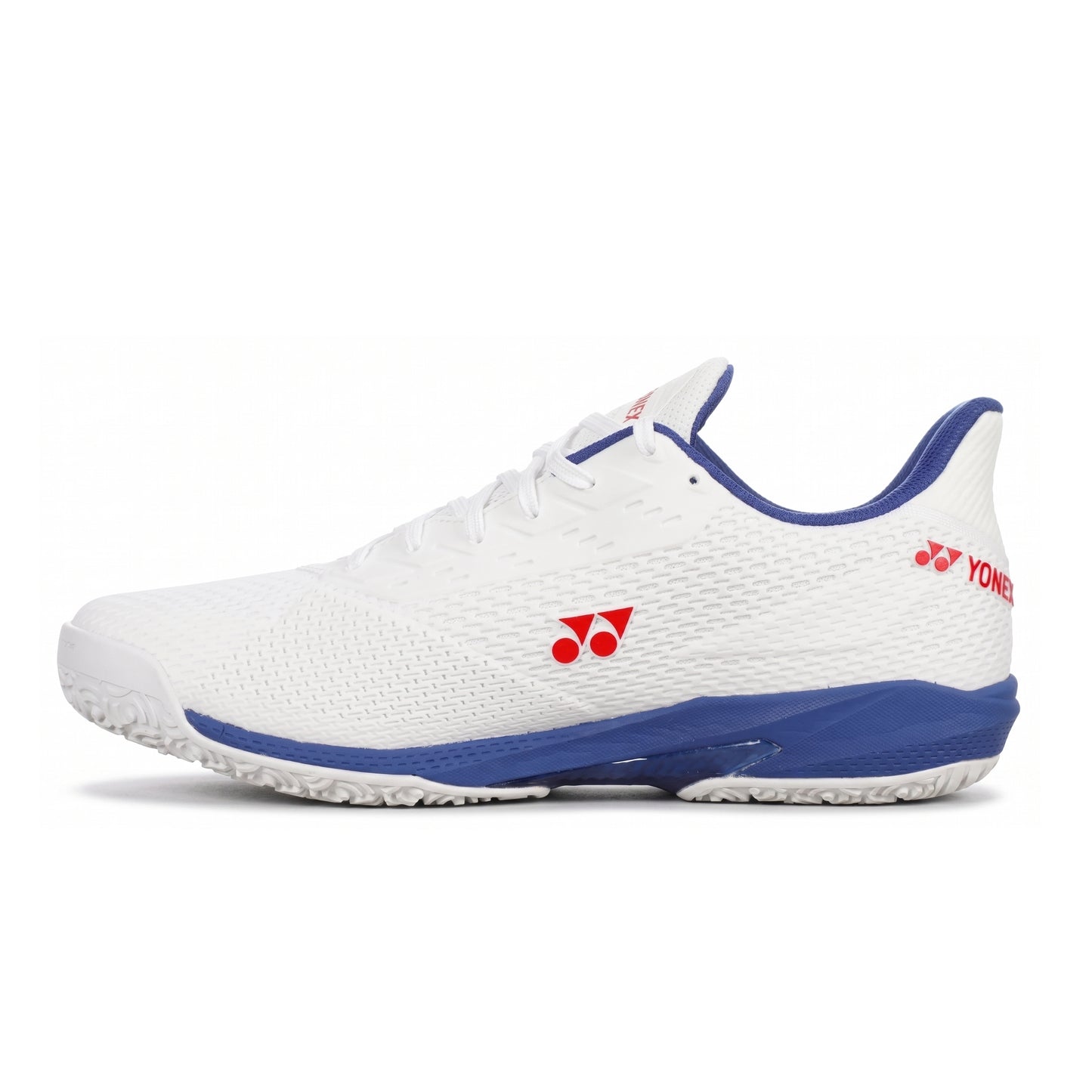 White and blue Yonex tennis shoe with red accents on a white background
