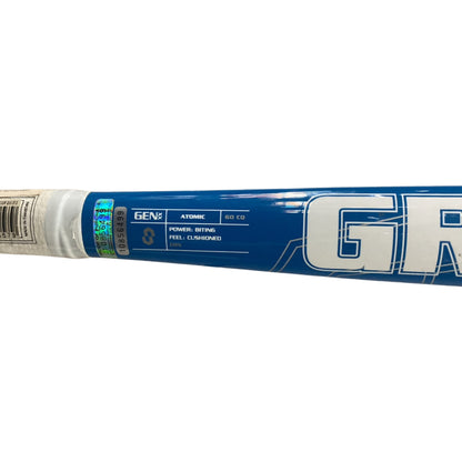 A close-up of a blue and white hockey stick grip showing the brand 'GEN1' and model 'ATOMIC'.