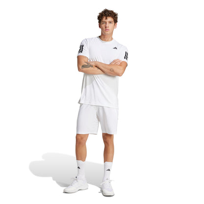 Person wearing an Adidas white outfit with a white background