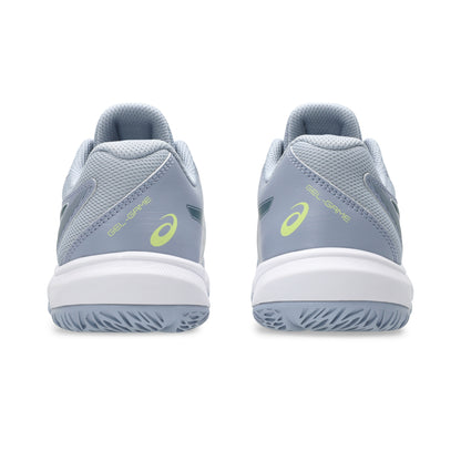 Pair of gray tennis kids shoes with green accents on a white background
