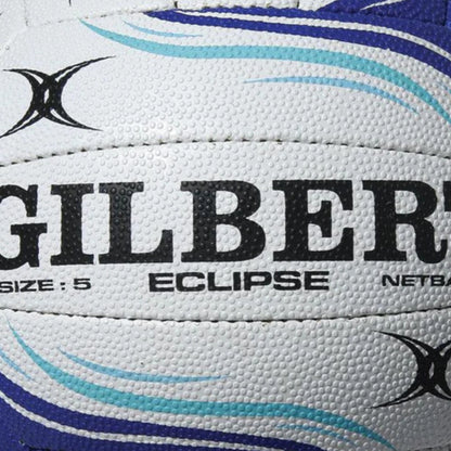 Close-up of a Gilbert Eclipse netball with branding and size information.