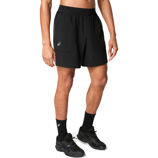 Man wearing black shorts on a white background