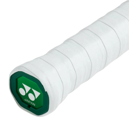 White tennis racket grip with green accent and 'Japan' text on a white background
