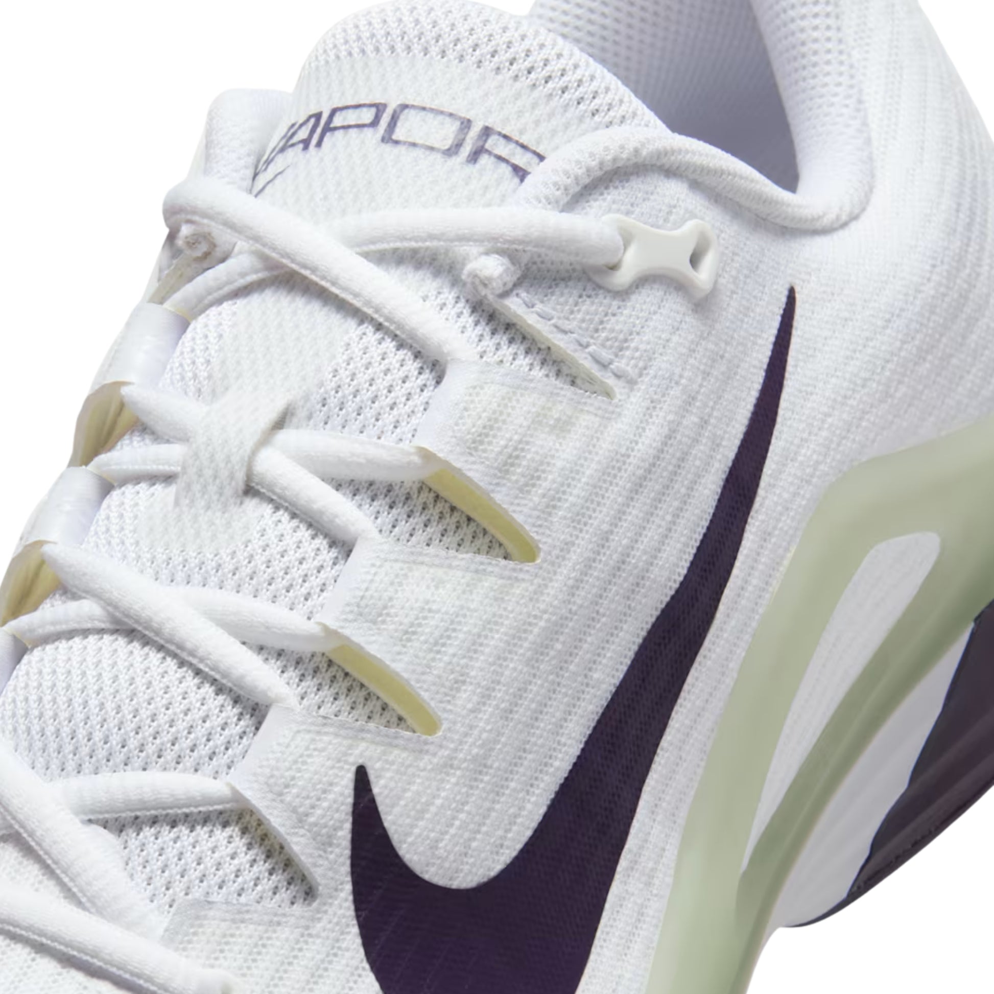 White tennis shoe with navy swoosh logo on a white backgrounda