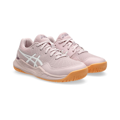 Pink Asics tennis shoes with orange soles on a white background