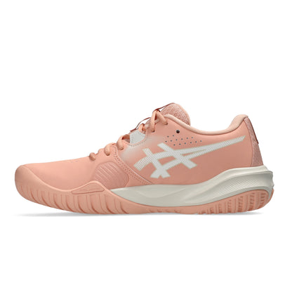A single Asics tennis shoe in a soft peach and white colorway, shown from the side profile against a clean white background.