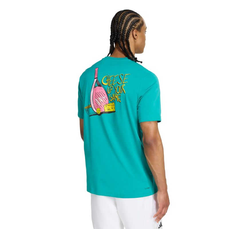 Person wearing a teal t-shirt with a graphic design on the back, standing against a white background.