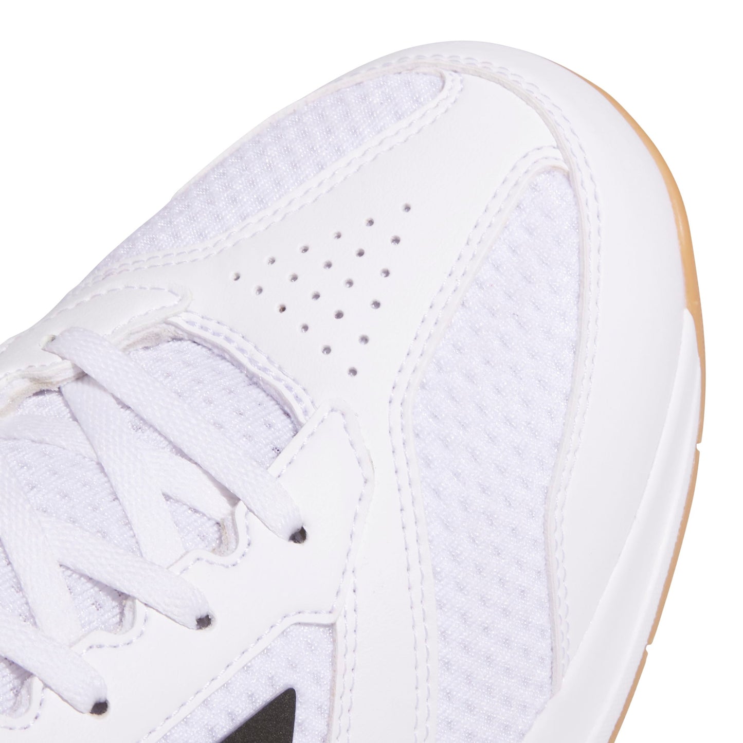 Close-up of a white squash shoe with a light brown sole on a white background