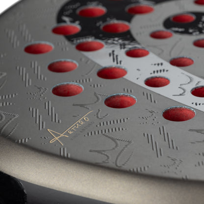 Close-up of a black and red patterned product with 'Aerello' branding.