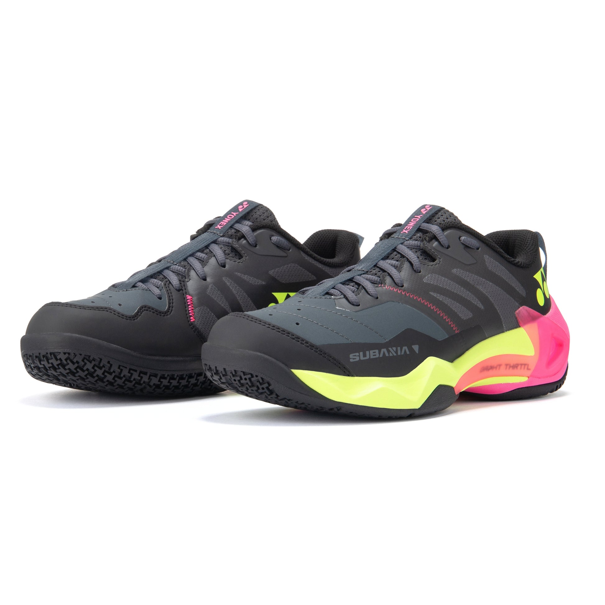 Pair of black and pink Yonex shoes with yellow accents on a white background