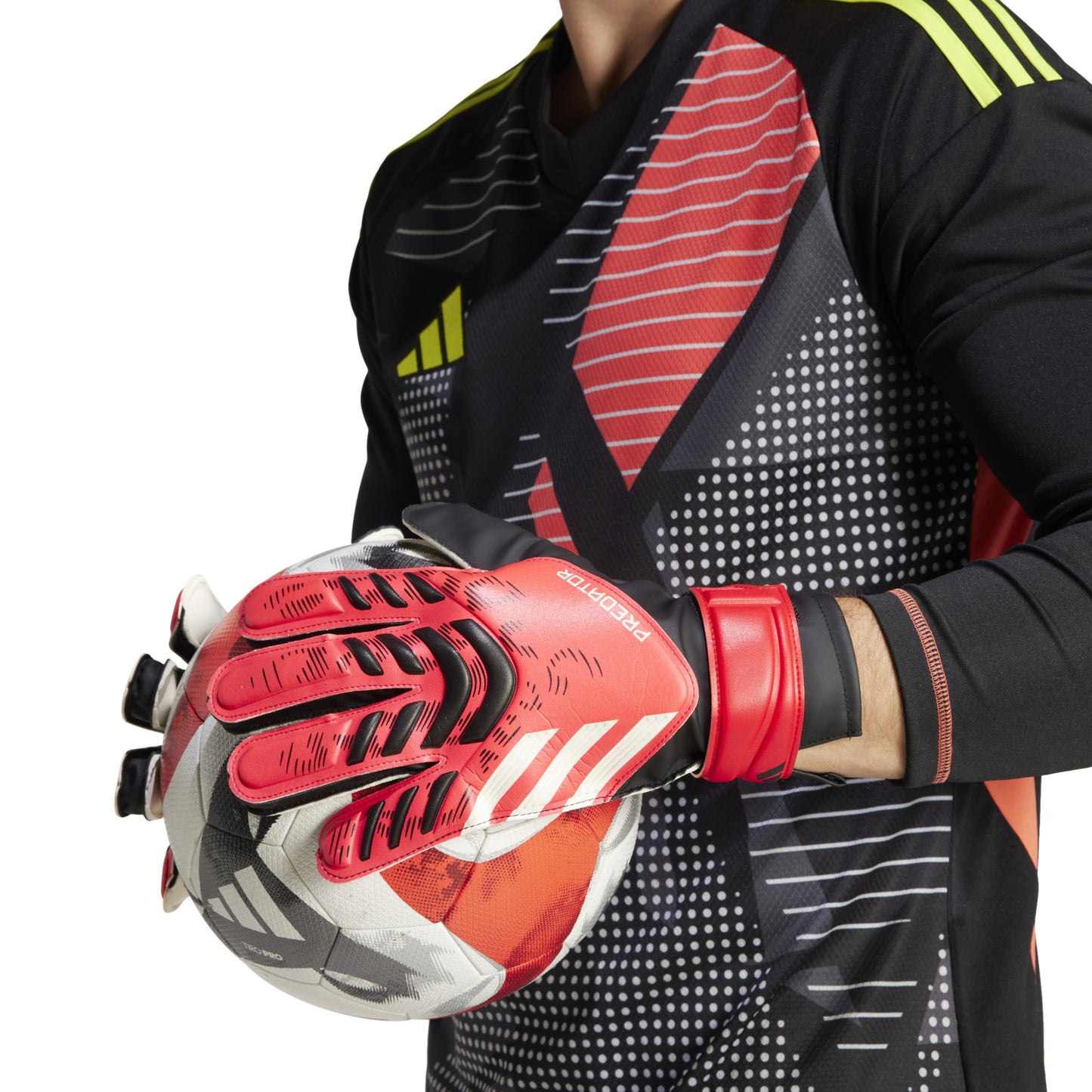 Soccer gloves Adidas holding a soccer ball 