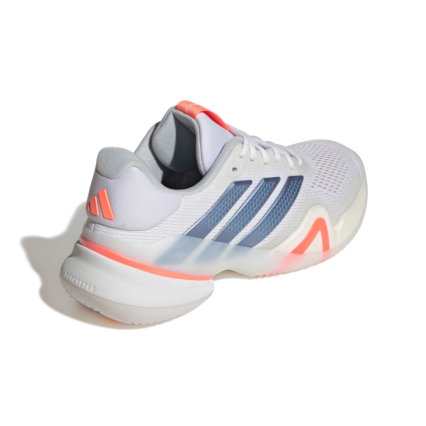 White adidas tennis shoe with blue and orange accents on a white background