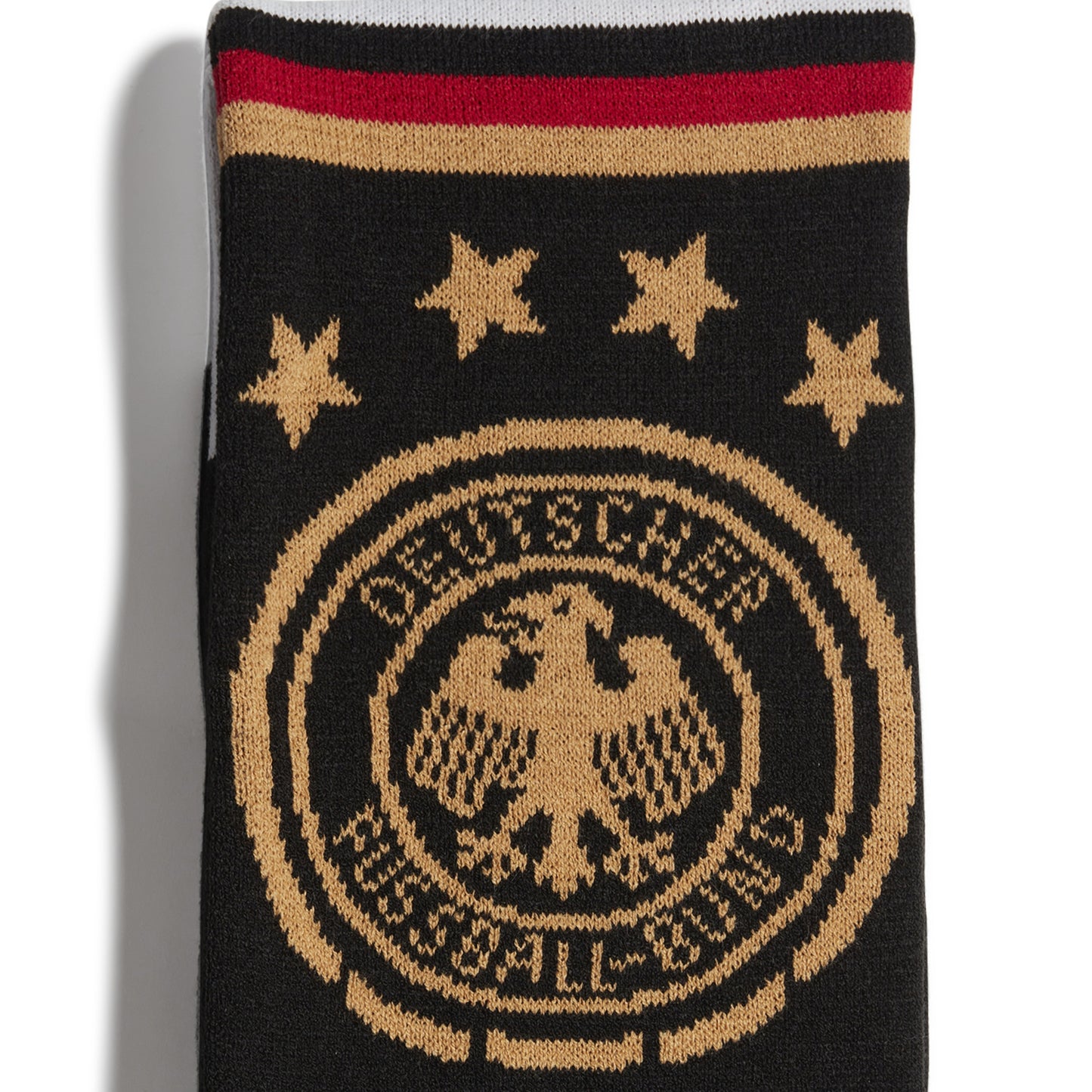 Black and gold scarf with star patterns and text on a white background