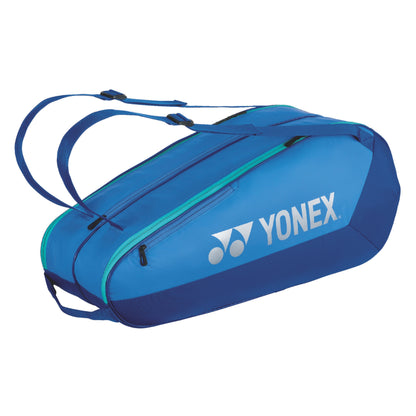 Blue Yonex tennis bag on a white background