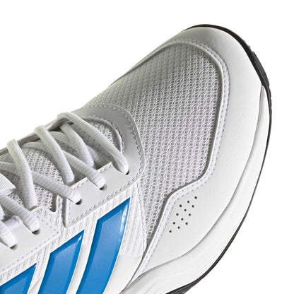 Close-up view of the front of a adidas tennis shoe with blue logo and mesh design upper shoe on a white background.