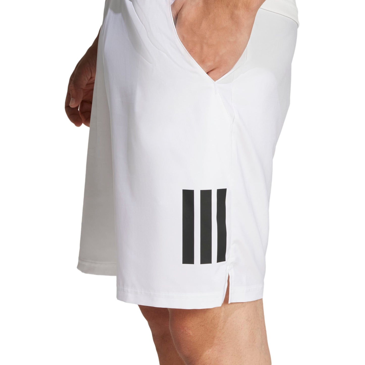 White adidas athletic shorts with black stripes on a white background
