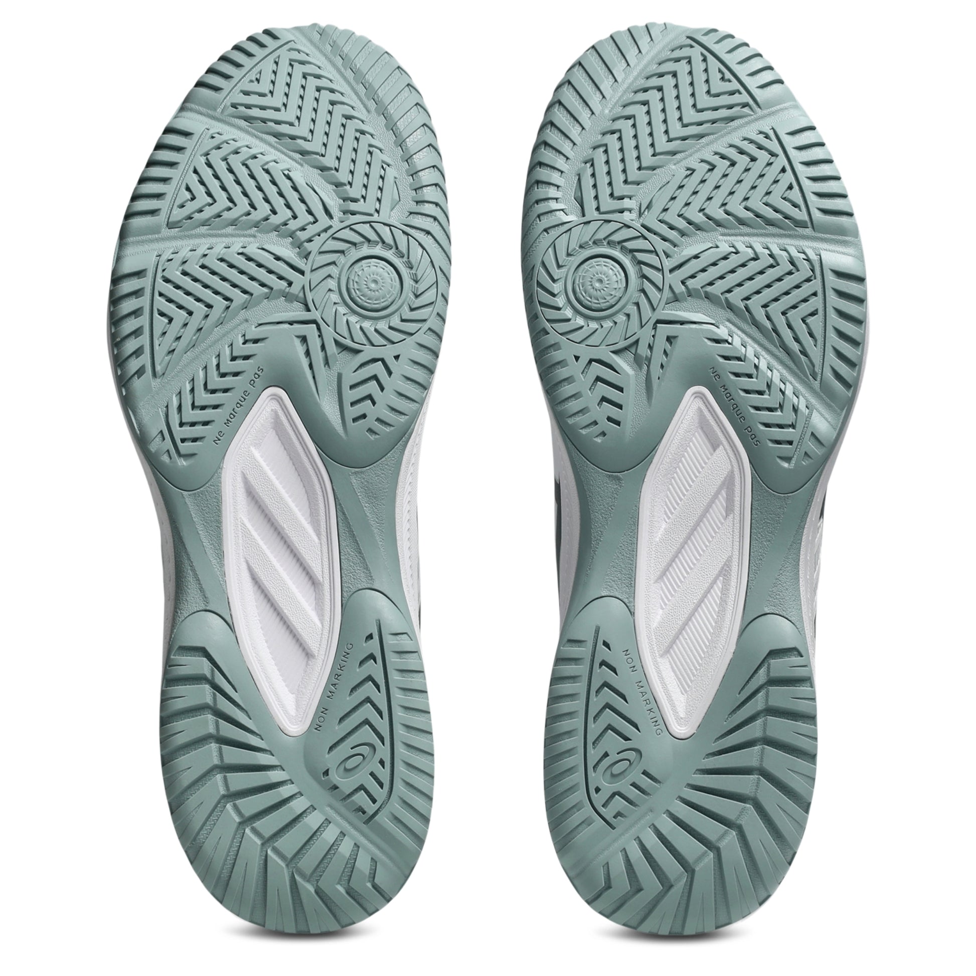 The outsoles of a pair of squash shoes, shown from the bottom against a white background. The outsole is a muted sage green with a white central channel and detailed tread patterns.