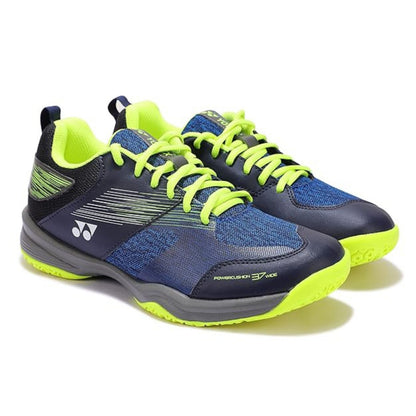 Blue and green athletic shoes on a white background