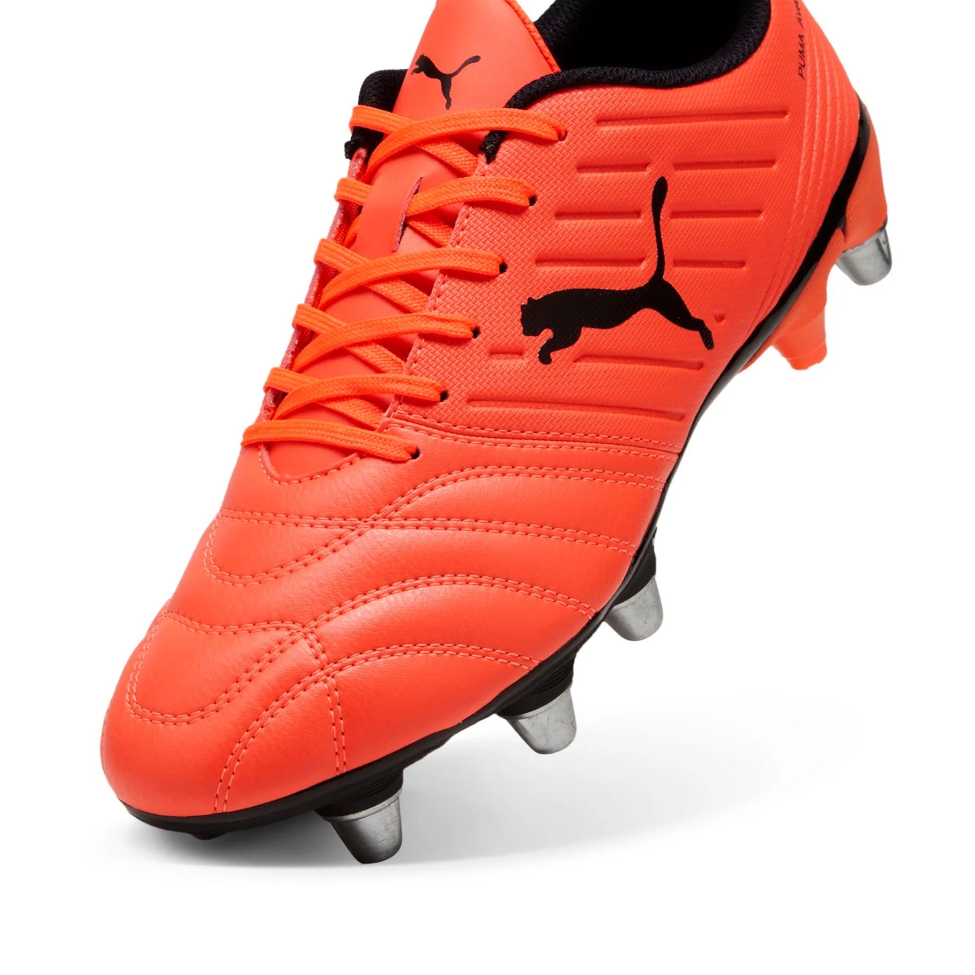 Red rugby boot with black Puma logo on a white background