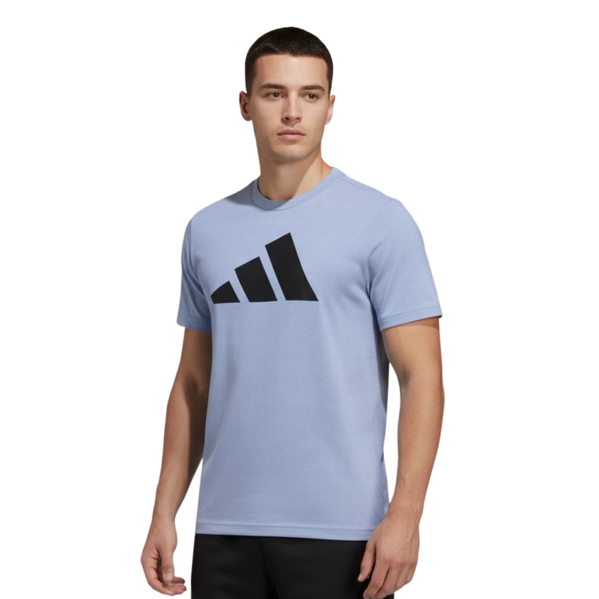 Man wearing a light blue t-shirt with a black adidas logo on a white background
