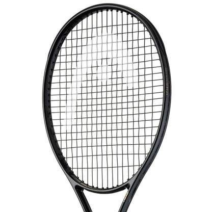 Close-up of a black Head tennis racket with a white background