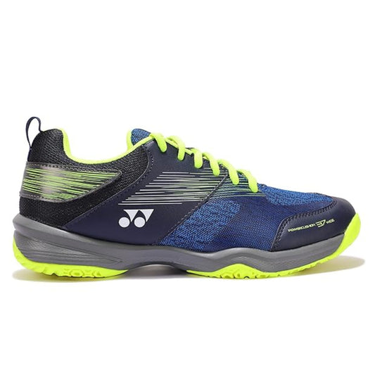 Blue and black athletic shoe with neon green accents on a white background