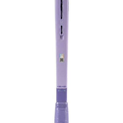 Close-up of a purple HEAD tennis racket showing the textured handle and part of the throat on a white background.