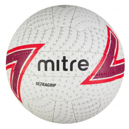 White netball balll with red and purple accents and Mitre branding on a white background