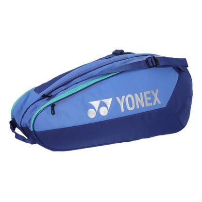 Blue Yonex tennis bag on a white background