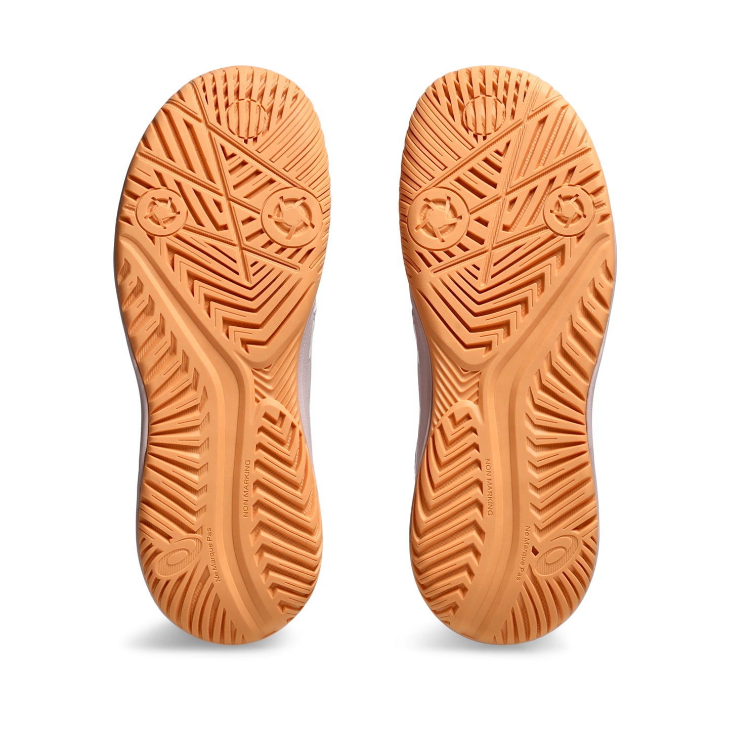 Close-up of orange Asics shoe soles with tread pattern on a white background