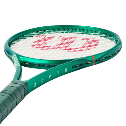 Green tennis racket with Wilson logo on a white background