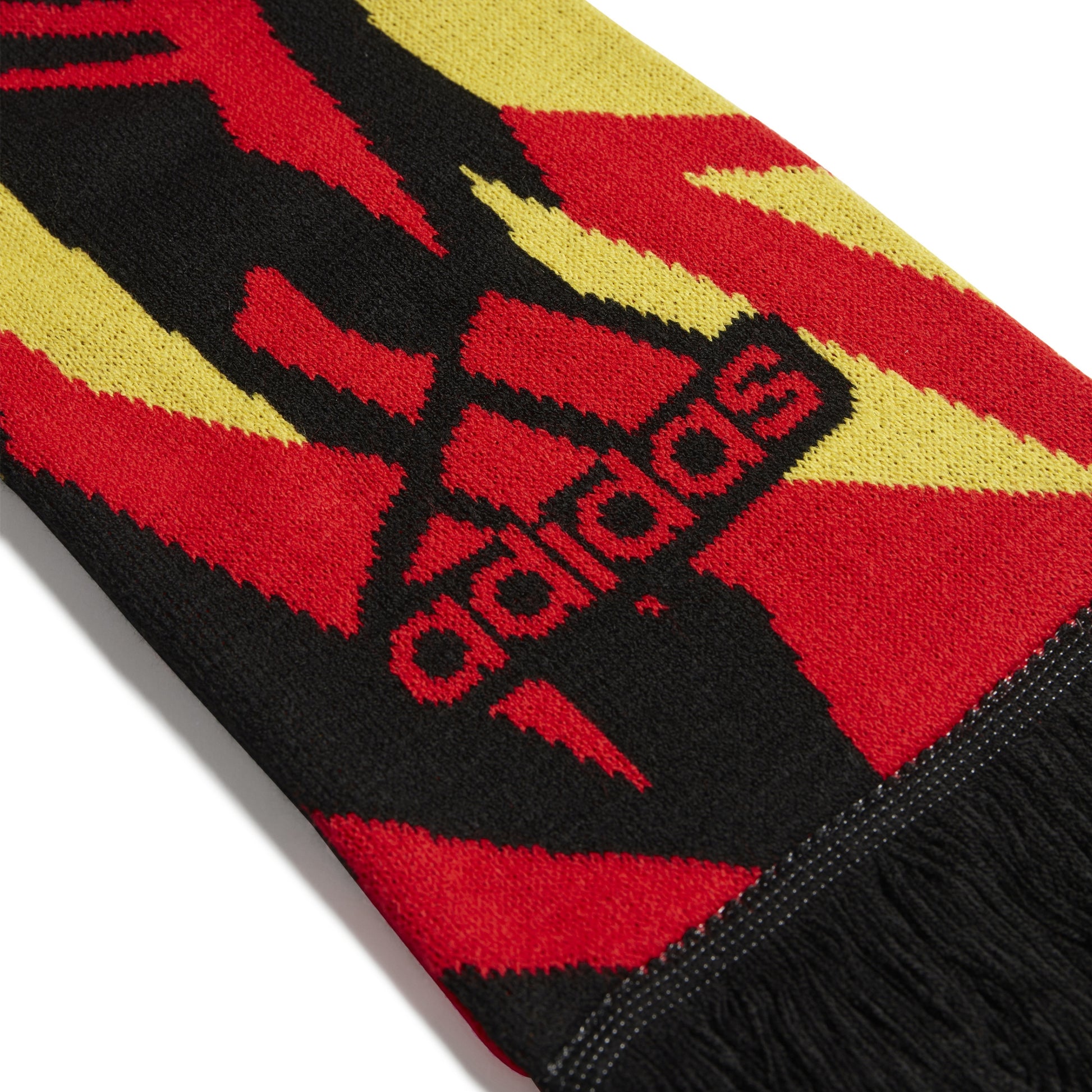 Red, black, and yellow Adidas scarf with logo