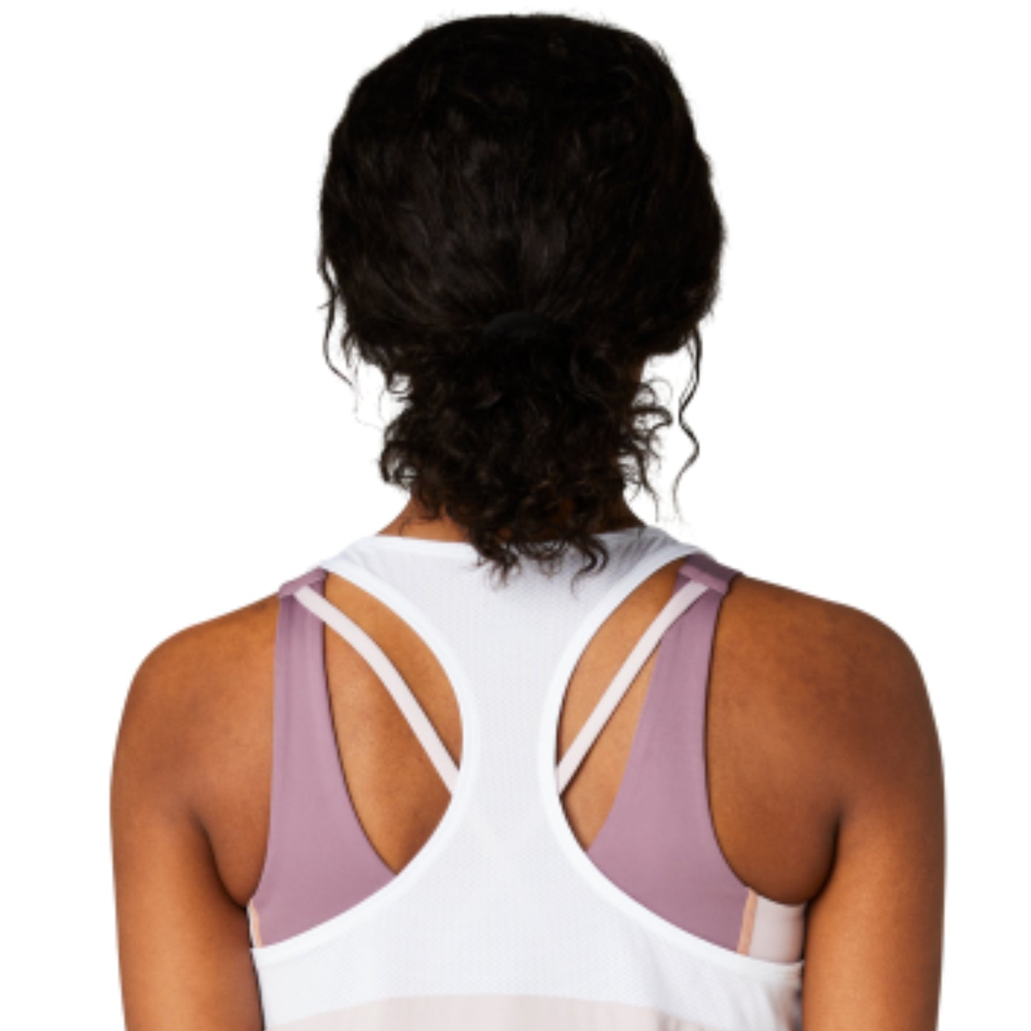 Back view of a woman wearing a light rose Asics tank top with thin straps on a white background