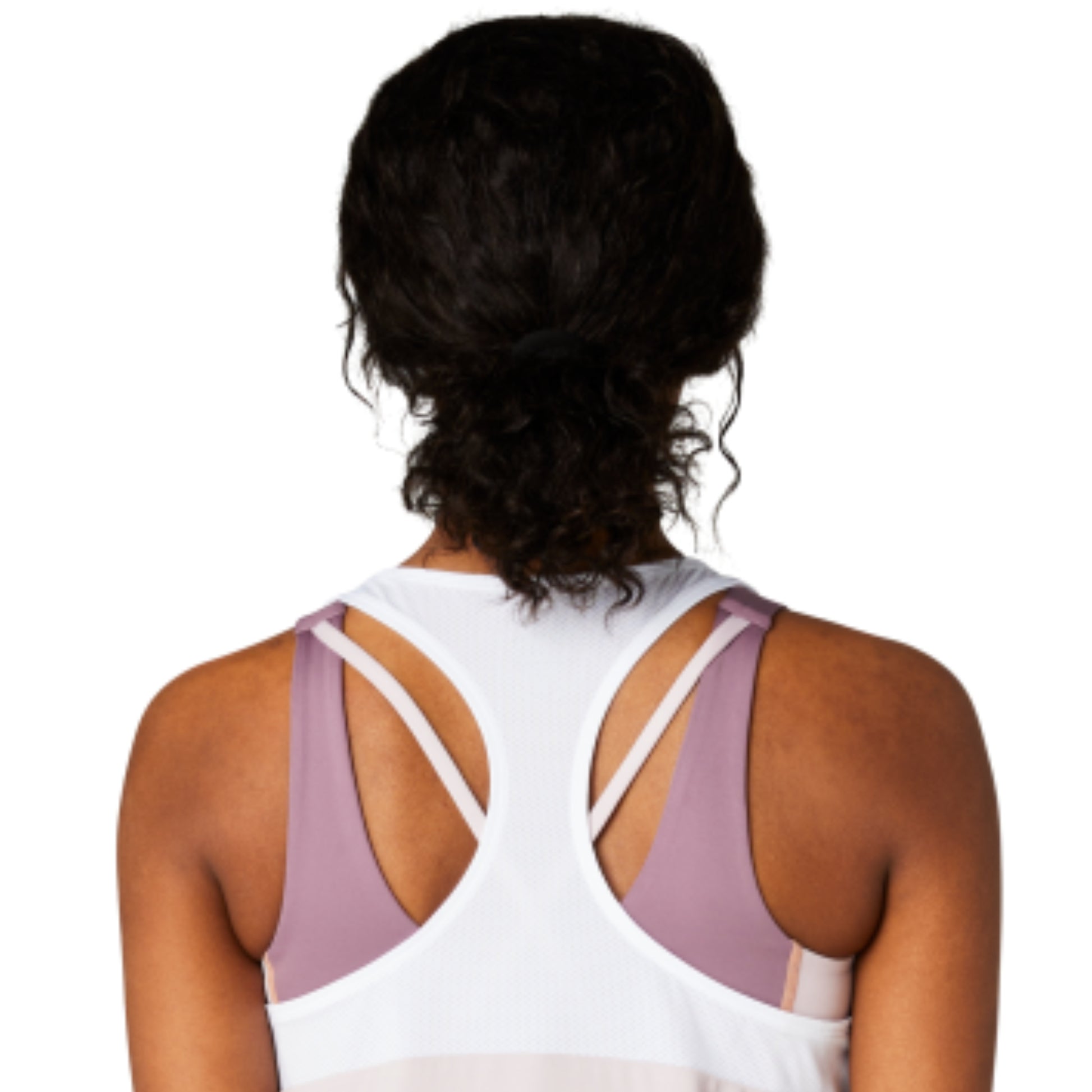 Back view of a woman wearing a light rose Asics tank top with thin straps on a white background