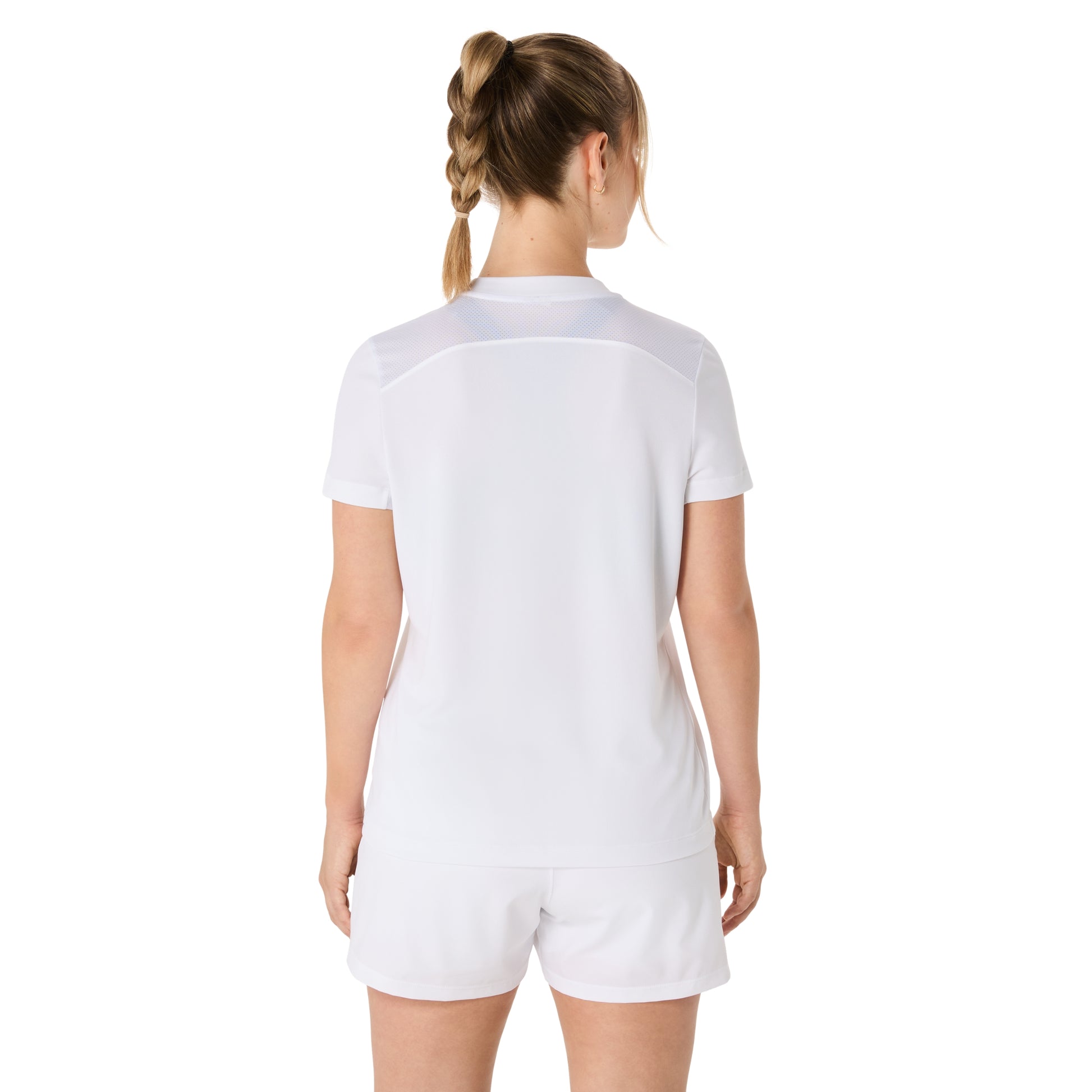Woman wearing a white outfit on a white background