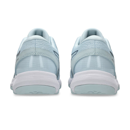 Light blue netball shoes with white soles on a white background