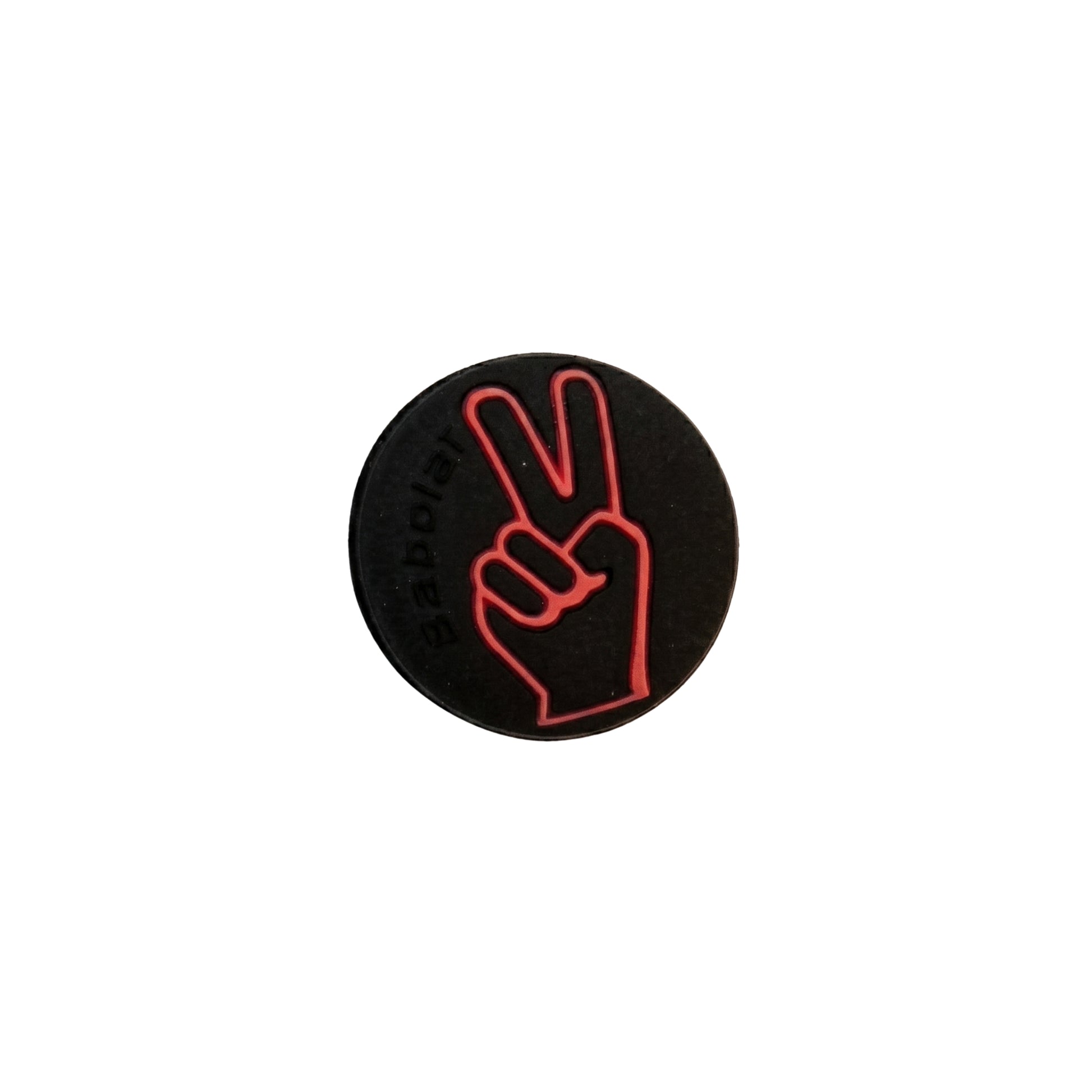 Orange and black Babolat Dampener on a white background