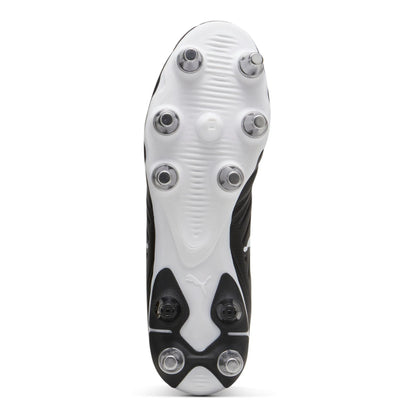 Close-up of a rugby boot with metal studs on a white background