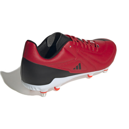 Red and black rugby boot with white sole on a white background