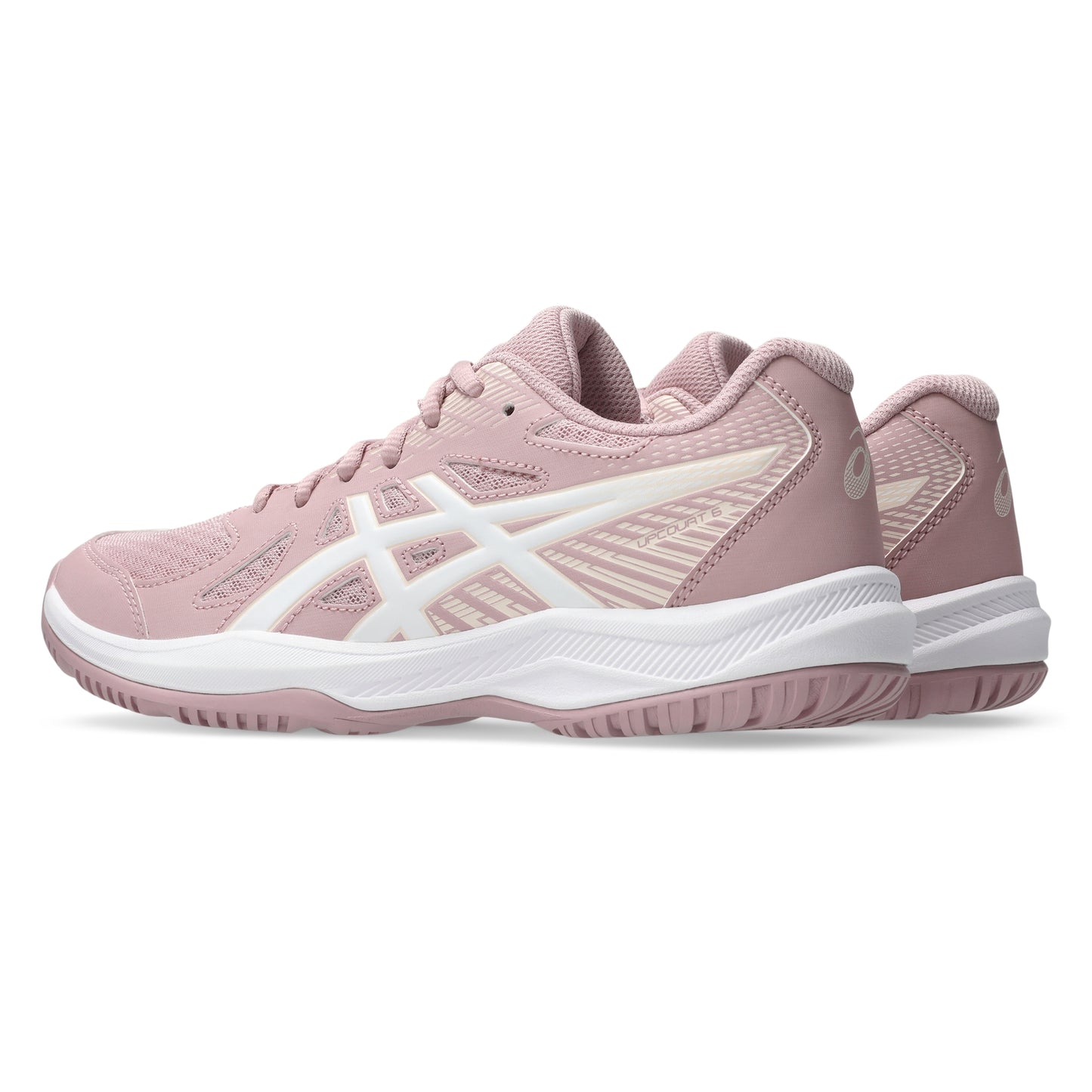 Pink athletic shoe with white sole on a white background