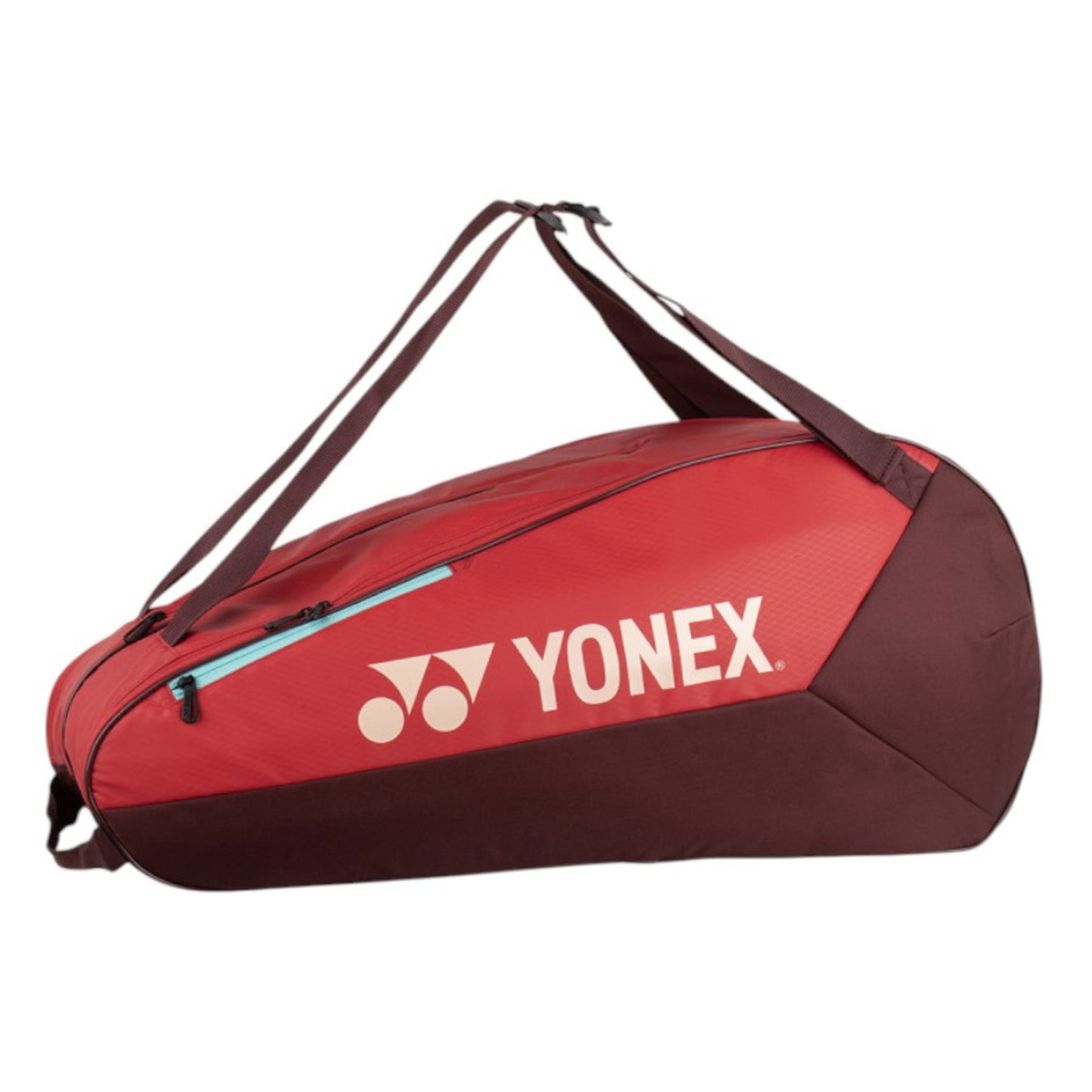Red and brown Yonex tennis bag on a white background