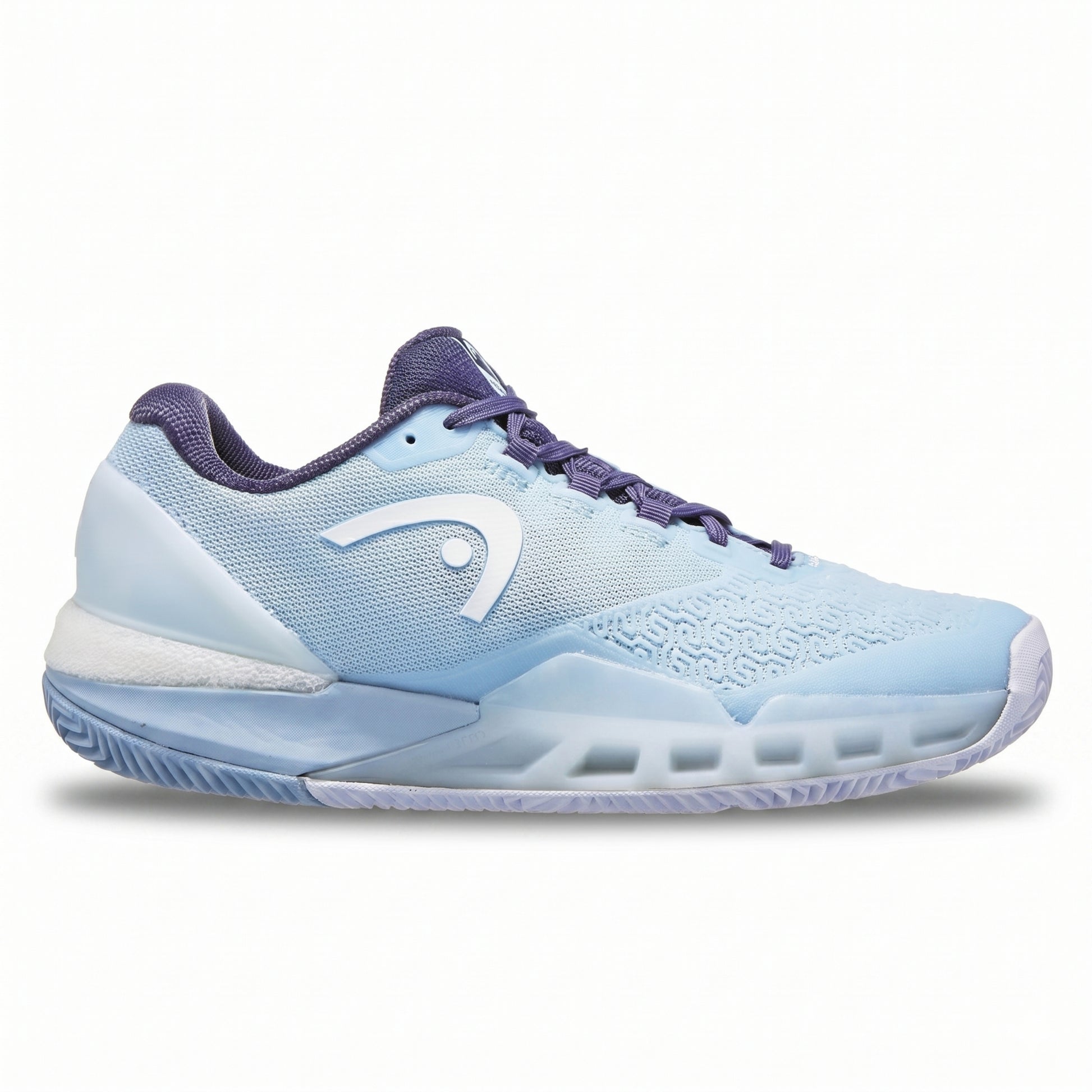 Light blue Head tennis shoe with dark blue accents on a white background
