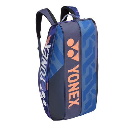 Blue and navy Yonex racket bag on a white background